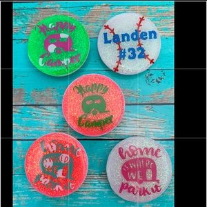 Phone holders pop open and shut. Personalized